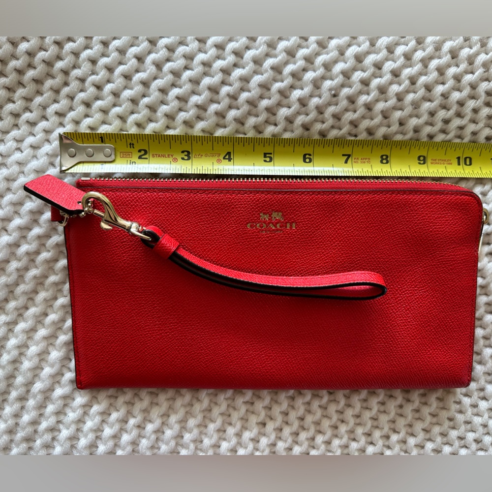 Coach cross grain embossed logo 10” wristlet w/removable strap. 6 cc slots